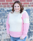 pink and ivory color block sweater from Favored And Common in NC