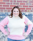 Pink and ivory color block turtle neck from Favored And Common in NC