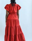 Rust colored maxi dress with short sleeves and cinched waist from Favored and Common