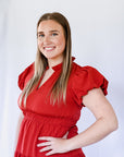 V-neck rust colored midi dress with short bubble sleeves from Favored and Common
