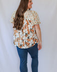 Flowy floral blouse for women from Favored And Common in NC