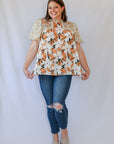Flowy high neck floral blouse with bubble sleeves