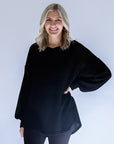 Black waffle knit sweater for women from Favored And Commons Boutique.
