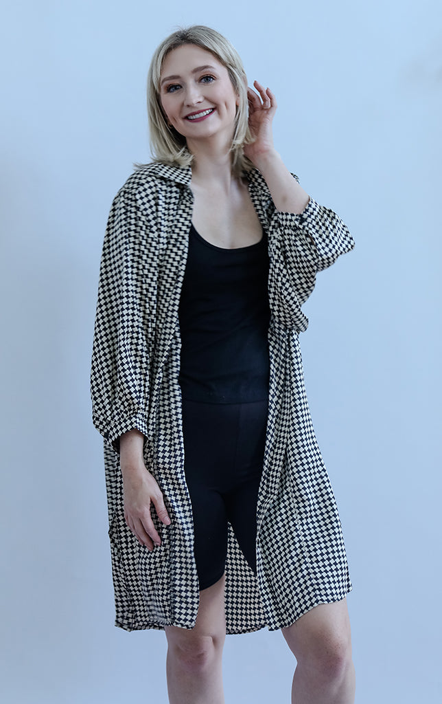 Black and white check button down blouse with collar from Favored And Common