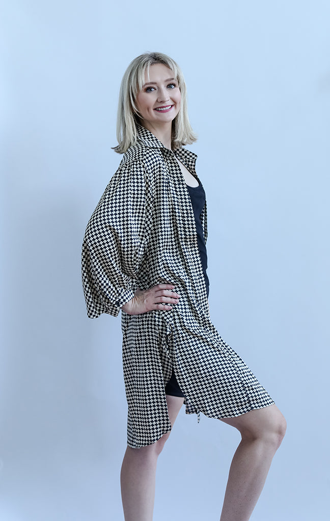 Black and white flowy check satin blouse from Favored And Common in NC