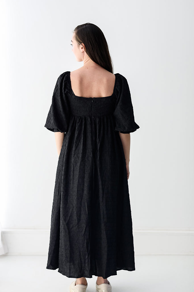 Black maxi dress with square neckline and zip up back from Favored And Common in NC