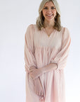 Blush pink textured mini dress from Favored and Common in NC 