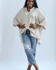 Champagne button down blouse with three quarter sleeves from Favored and Common