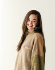 Color block turtle neck sweater with zipper pocket from Favored And Common Boutique in NC