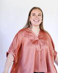 Copper satin v-neck flowy blouse from Favored and Common in NC