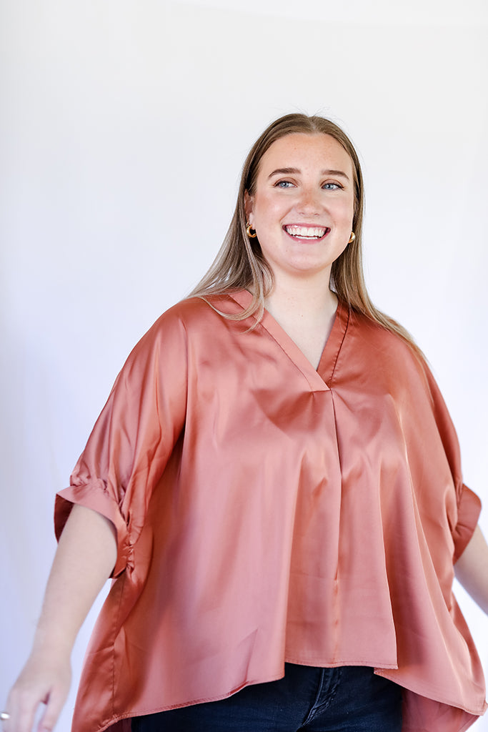 Copper satin v-neck flowy blouse from Favored and Common in NC