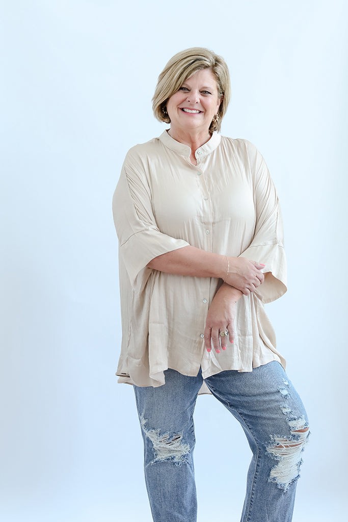 Flowy sating blouse with three quarter length sleeves from Favored and Common in NC 