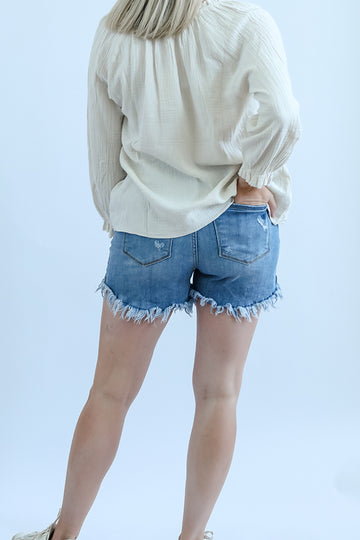 Frayed hem stretchy jean shorts for women from Favored and Common