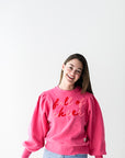 Full of cheer chenille font sweatshirt from Favored And Common in NC