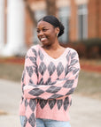 fuzzy pink and grey argyle sweater from  Favored and Common