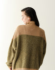 Green and brown color block sweater from Favored And Common in NC