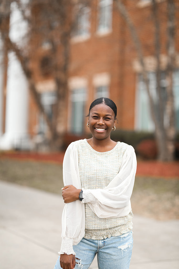 Green tweed blouse with sheer chiffon sleeves from Favored and Common in NC