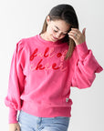 Hot pink Christmas crew neck sweatshirt from Favored And Common Boutique in NC