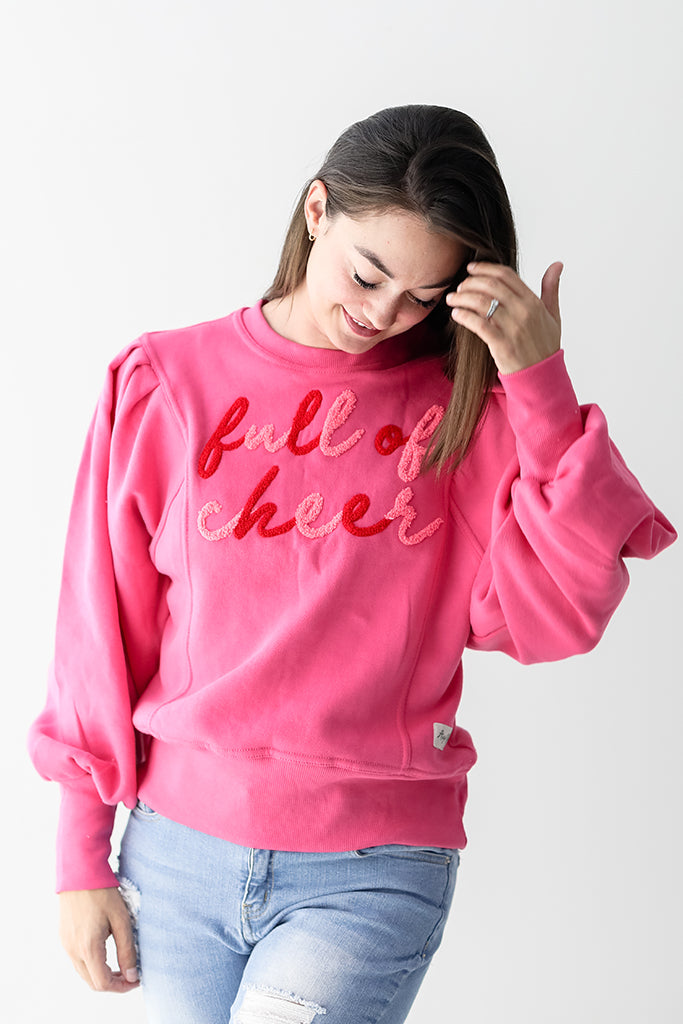 Hot pink Christmas crew neck sweatshirt from Favored And Common Boutique in NC