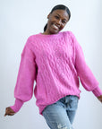 Hot pink sweater from Favored and Common with bubble sleeve