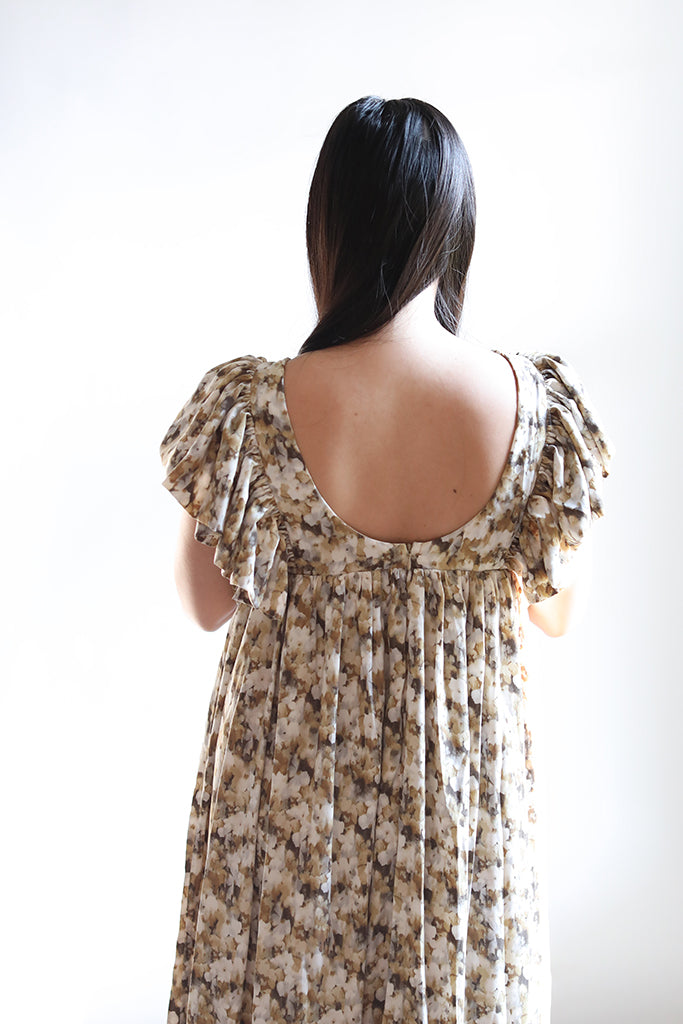 Ivory and brown floral dress with deep v-neck from Favored and Common in NC