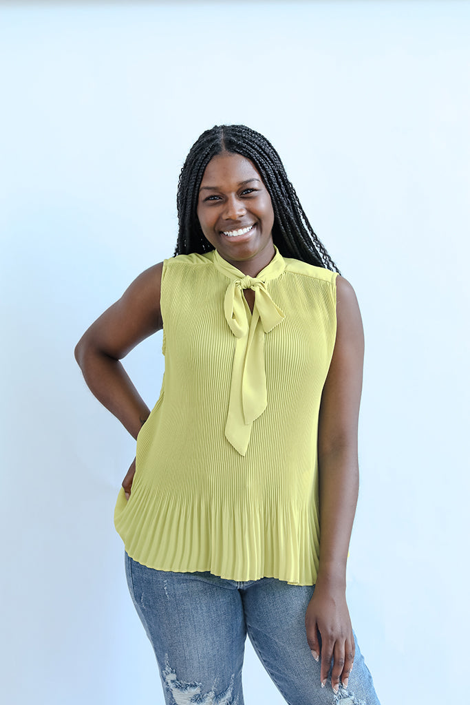 Lime green sleeveless blouse from Favored And Common