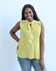 lime green sleeveless blouse with front tie from Favored And Common