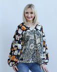 Mixed print blouse for women from Favored And Common in NC