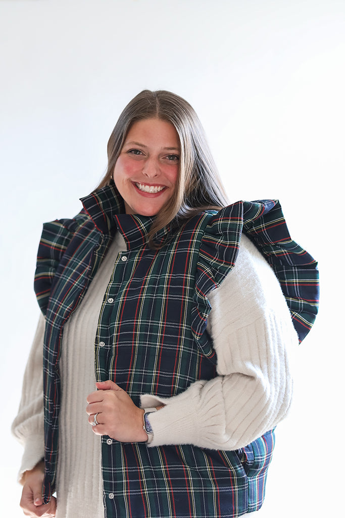 Navy plaid vest with ruffle sleeves from Favored And Common Boutique in NC