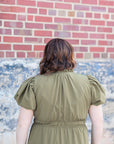 Olive green dress with ruffle neck from Favored and Common in NC