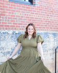 Olive green tiered dress with bubble sleeves from Favored and Common in NC