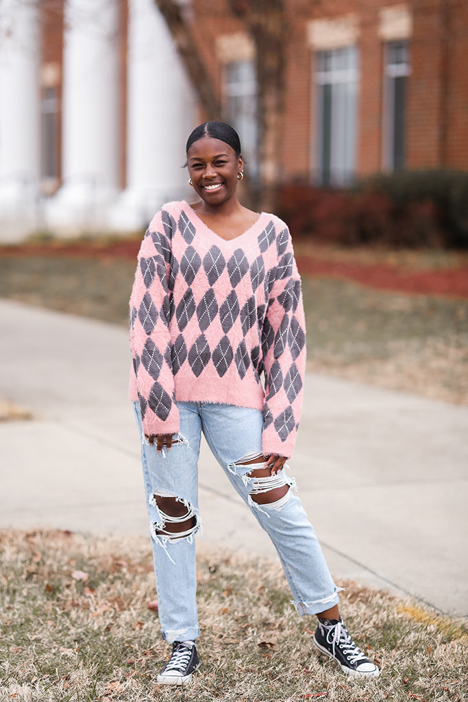 Pink and grey fuzzy v-neck argyle sweater from Favored and Common