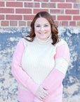 Pink and ivory turtle neck sweater from Favored And Common in NC