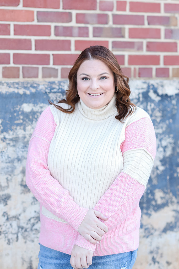 Pink and ivory turtle neck sweater from Favored And Common in NC