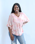 Pink and purple flowy blouse for women from Favored And Common in NC