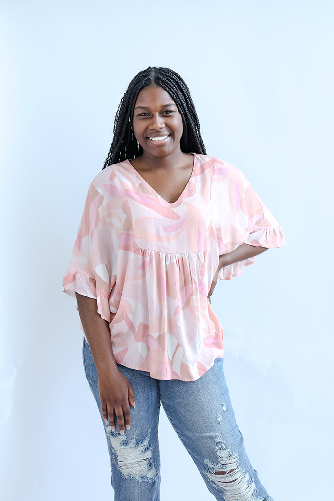 Pink and purple flowy blouse for women from Favored And Common in NC