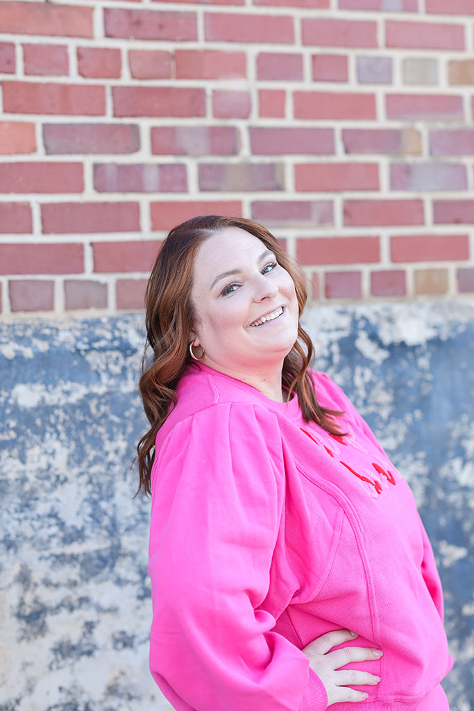 Pink and red chenille full of cheer sweatshirt for women from Favored And Common in NC