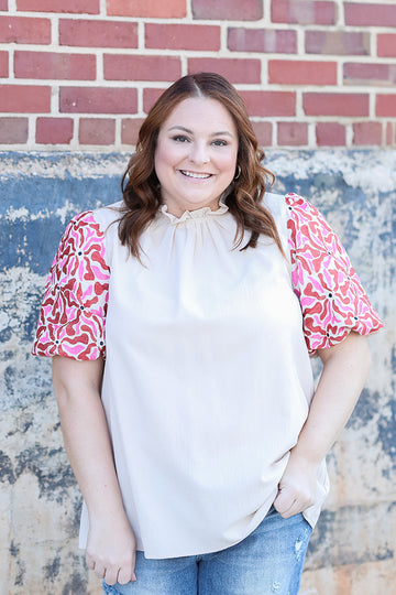 Pink and red puff sleeve blouse for women from Favored And Common in NC