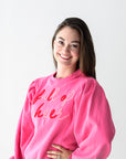 Pink and red sweatshirt for women from Favored And Common Boutique in NC