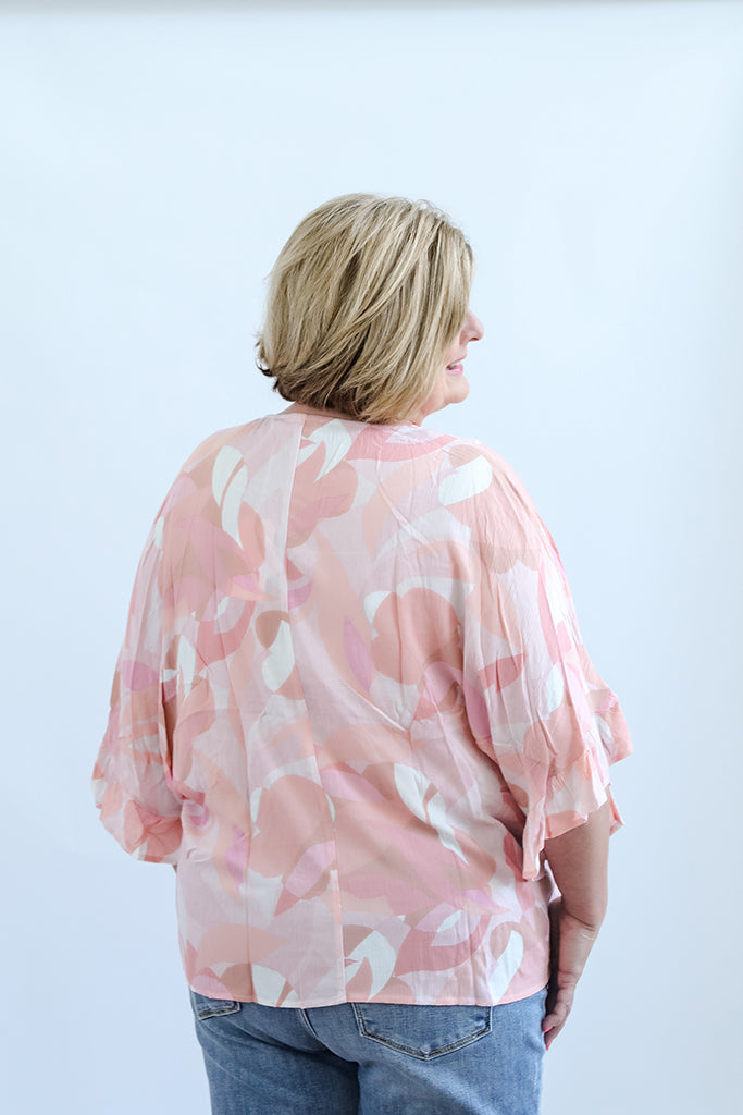 Pink and white retro pattern blouse for women from Favored And Common Boutique 