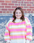 Pink and yellow striped sweater with balloon sleeves from Favored And Common in NC