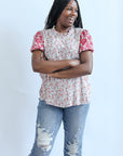 Pink floral embroidered high neck blouse from Favored And Common