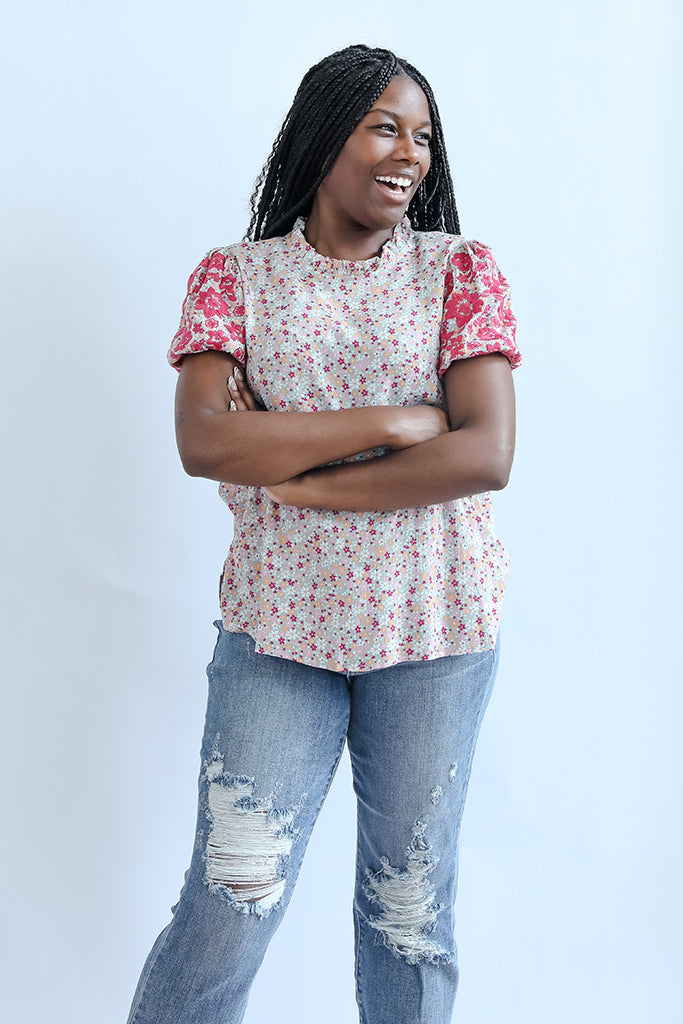 Pink floral embroidered high neck blouse from Favored And Common