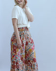 Pink floral flowy pants for women from Favored And Common