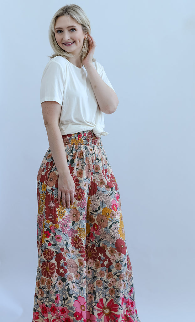 Pink floral flowy pants for women from Favored And Common