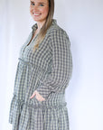 plaid long sleeve mini dress with pockets from Favored And Common