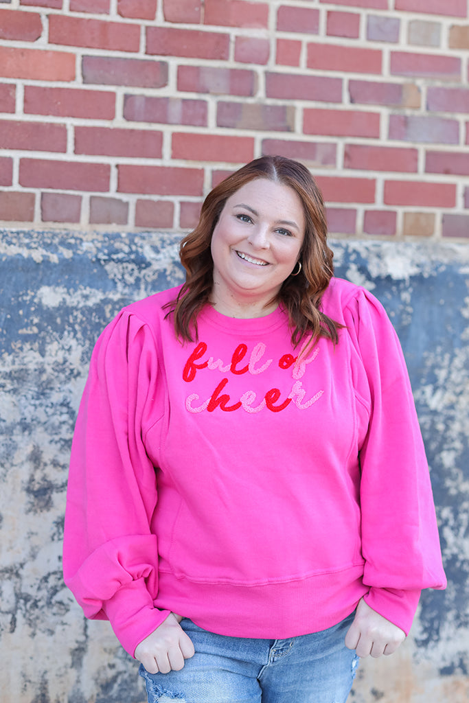 Plus size pink Christmas sweatshirt from Favored And Common