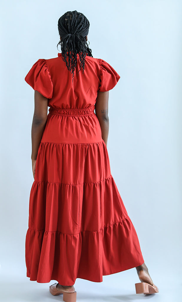 Rust colored maxi dress with short sleeves and cinched waist from Favored and Common