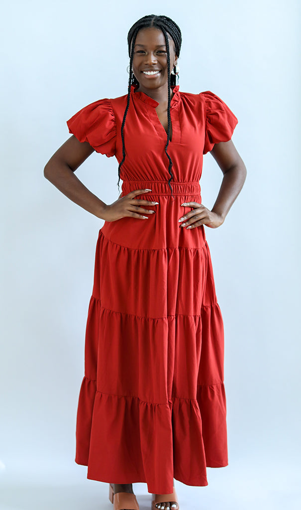 Rust maxi dress with puff sleeves and v-neck from Favored and Common