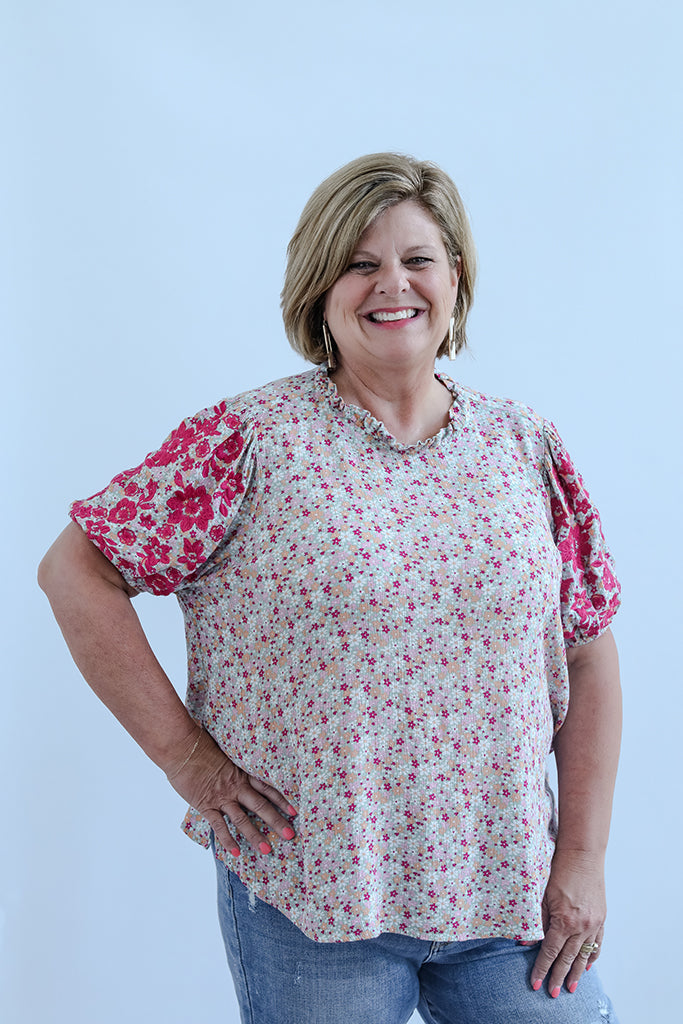 Sage green and pink floral blouse with embroidered sleeves from Favored And Common